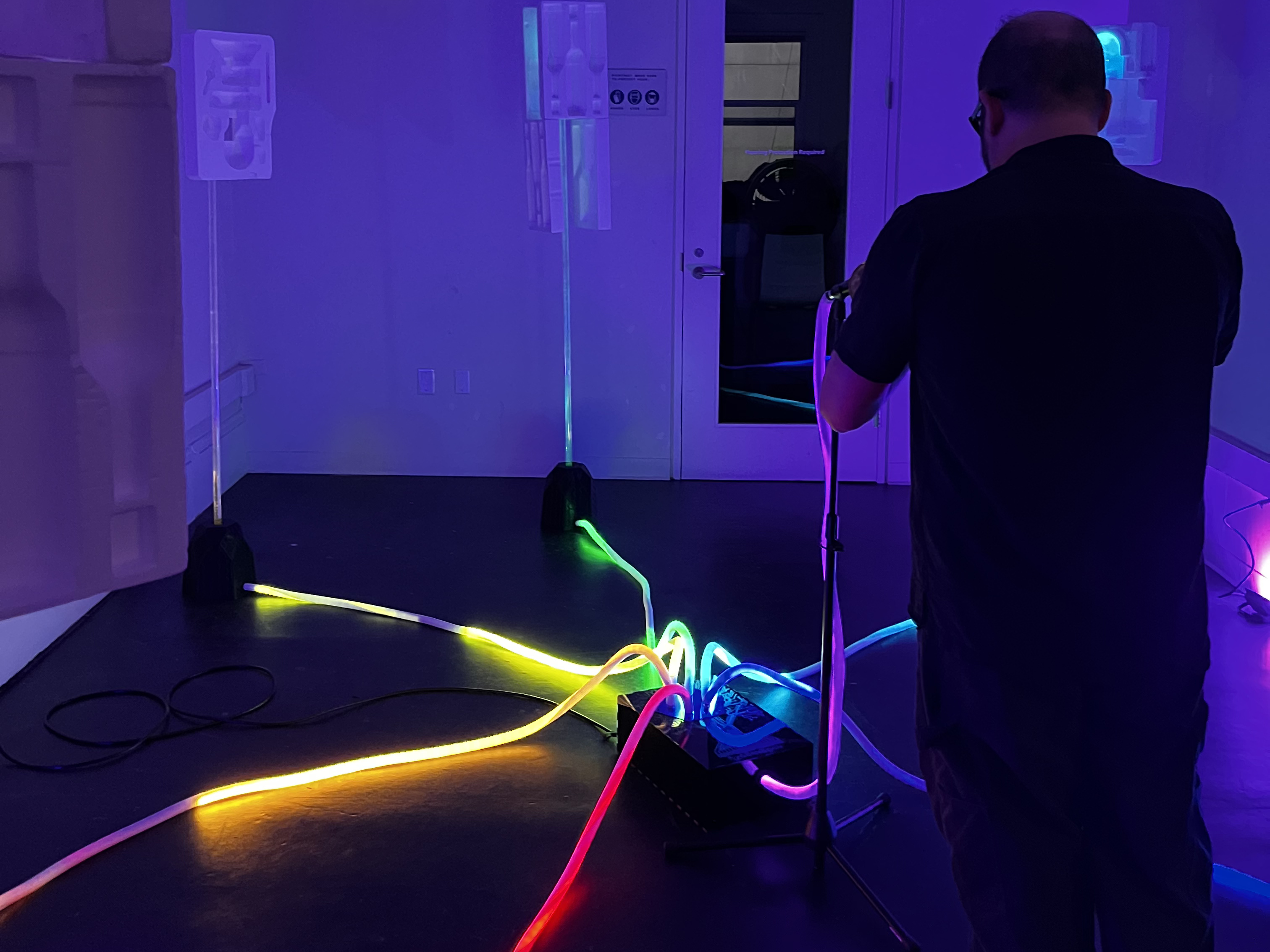 Installation at Electric SEA 2026, featuring a trumpet player